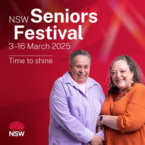 two-ladies-standing in front of red background