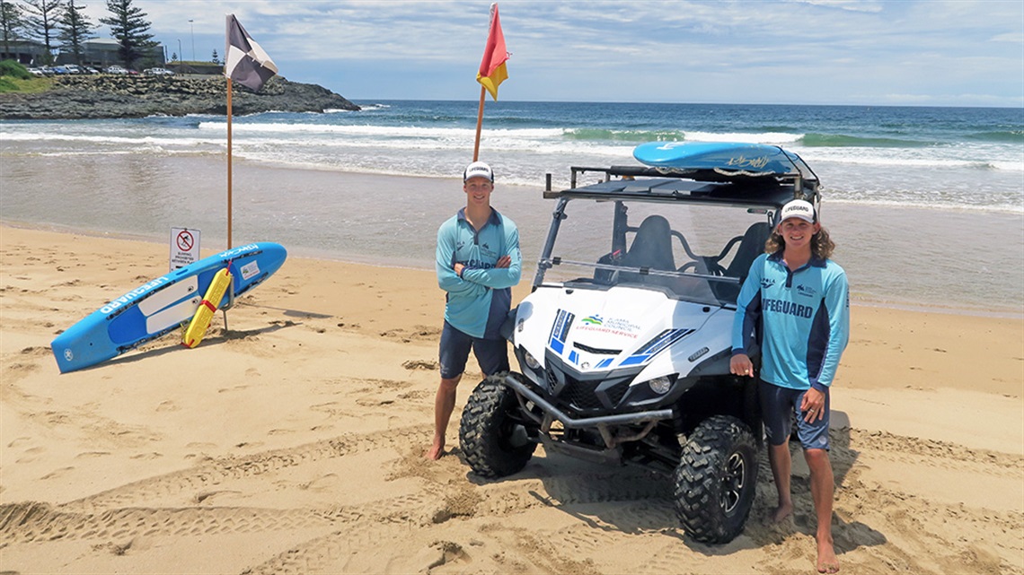 Lifeguards Zac McHugh and Jake Willick at Surf Beach on the first day of summer